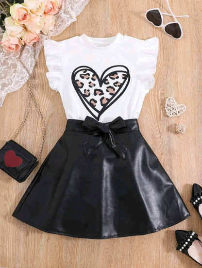 Heart blouse and black leather skirt