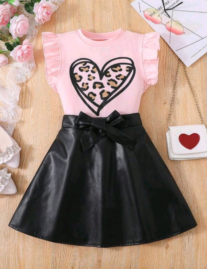 Heart blouse and black leather skirt