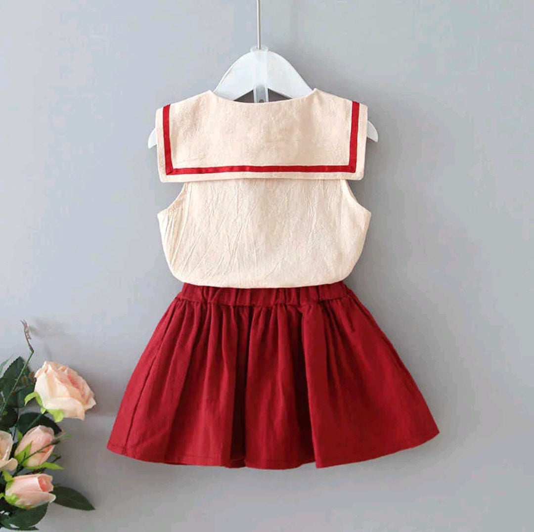 Sailor beige blouse and wine red skirt